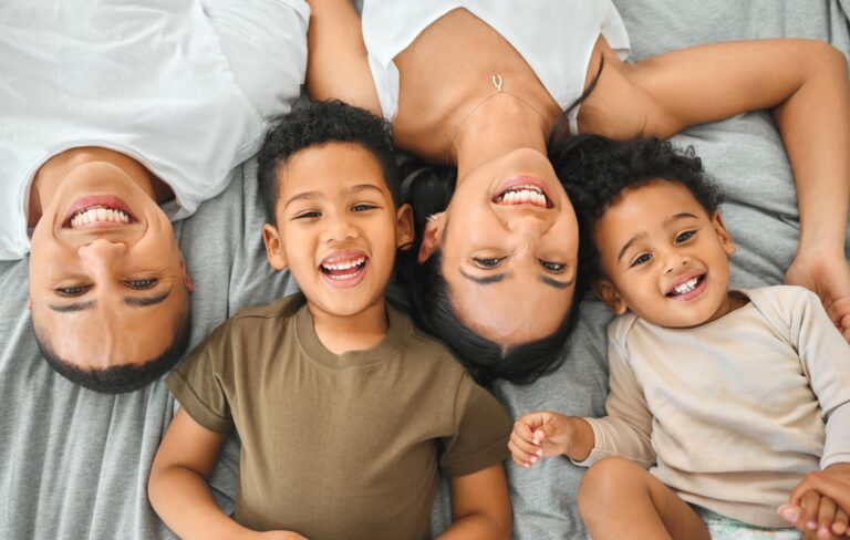 Family is the best support system. High angle shot of a young family relaxing together at home.